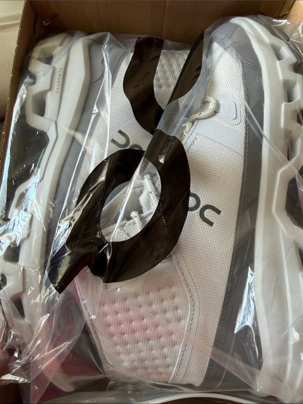 On Running Cloudrock Waterproof Mid-Top Boots in Light Grey and Dark Grey